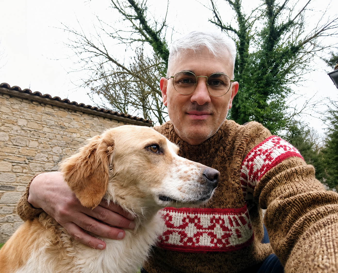 César Pablo Domínguez Prieto outdoors with a dog